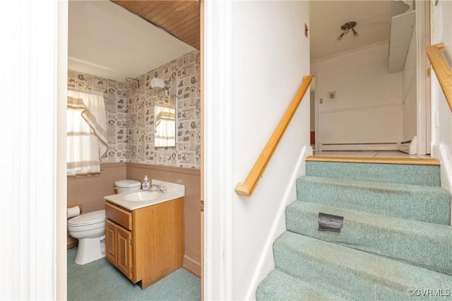9201 Claymont Dr, Henrico, VA 23229 - staircase with wallpapered walls, baseboard heating, and a wainscoted wall