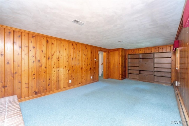9201 Claymont Dr, Henrico, VA 23229 - carpeted empty room featuring wood walls and baseboards