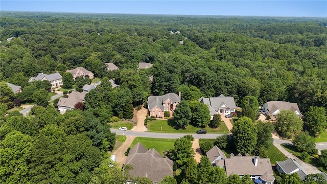 3105 Sapling Dr, Toano, VA 23168 - aerial view of residential area with a heavily wooded area