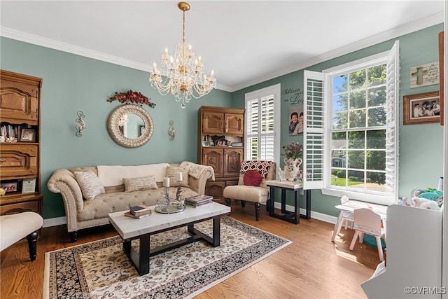 3105 Sapling Dr, Toano, VA 23168 - living room with crown molding, healthy amount of natural light, a chandelier, and light wood-style flooring
