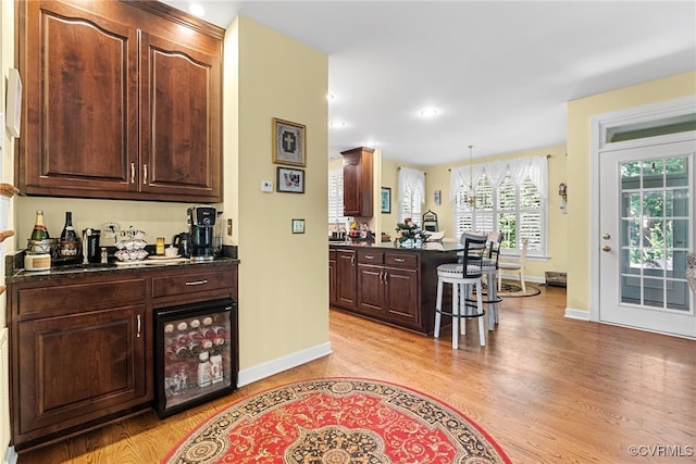 3105 Sapling Dr, Toano, VA 23168 - indoor dry bar featuring light wood-style floors, recessed lighting, and hanging light fixtures