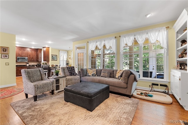 3105 Sapling Dr, Toano, VA 23168 - living area with light wood-style flooring and recessed lighting