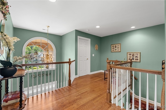 3105 Sapling Dr, Toano, VA 23168 - hallway featuring an upstairs landing, wood finished floors, and recessed lighting