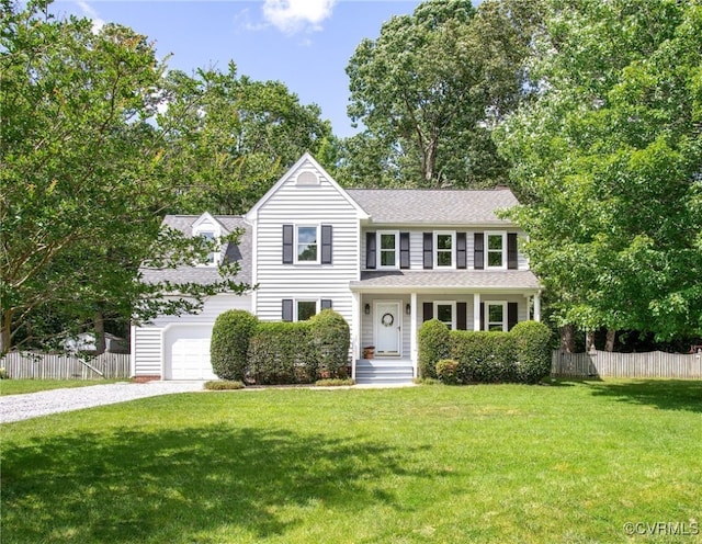 9154 Jump Cir, Mechanicsville, VA 23116 - traditional-style home with gravel driveway, a garage, and roof with shingles
