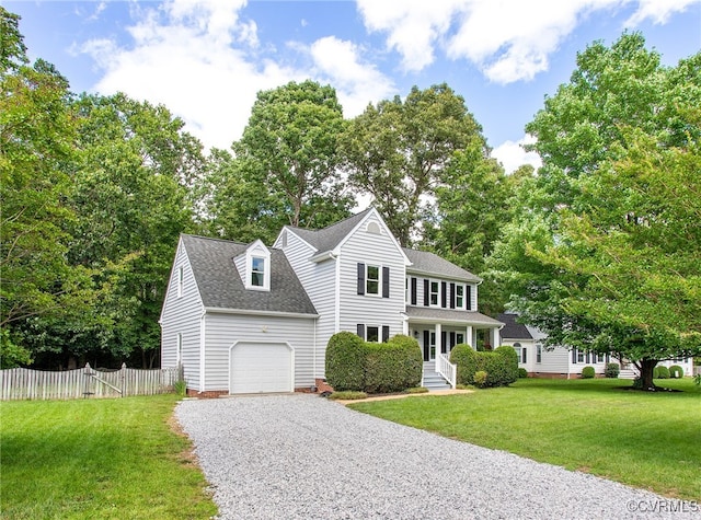 9154 Jump Cir, Mechanicsville, VA 23116 - view of front of house featuring a shingled roof, gravel driveway, and an attached garage