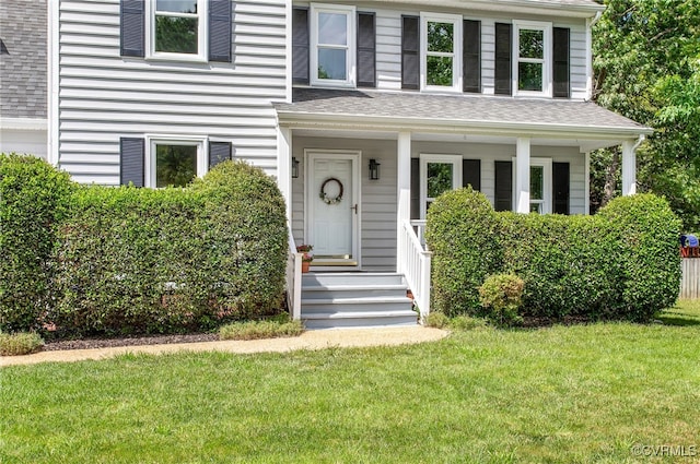 9154 Jump Cir, Mechanicsville, VA 23116 - view of front of property with a front lawn and a shingled roof