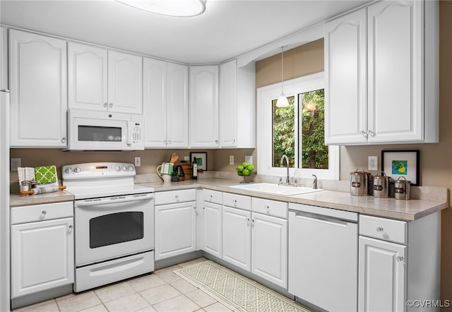 9154 Jump Cir, Mechanicsville, VA 23116 - kitchen with white appliances, white cabinets, and light countertops