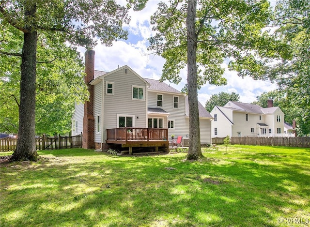 9154 Jump Cir, Mechanicsville, VA 23116 - back of house featuring a chimney and a wooden deck