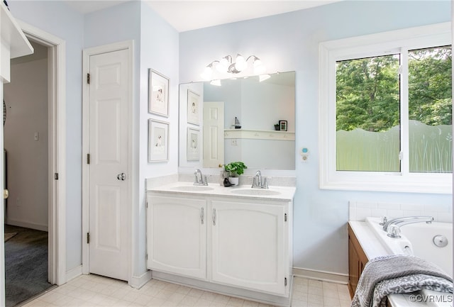 9154 Jump Cir, Mechanicsville, VA 23116 - bathroom featuring double vanity and a whirlpool tub
