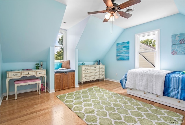 9154 Jump Cir, Mechanicsville, VA 23116 - bedroom featuring lofted ceiling, multiple windows, wood finished floors, and ceiling fan