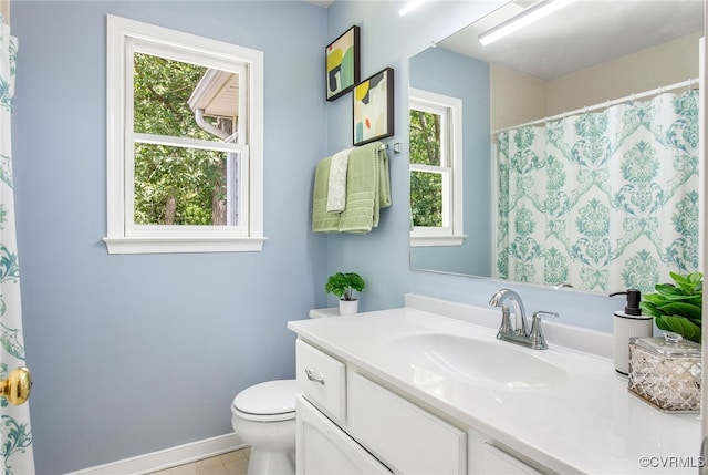 9154 Jump Cir, Mechanicsville, VA 23116 - bathroom featuring vanity, healthy amount of natural light, tile patterned floors, and curtained shower