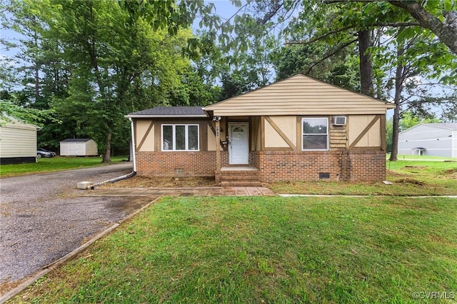 507 Tavern St, Blackstone, VA 23824 - view of front of house with brick siding, stucco siding, and a front lawn