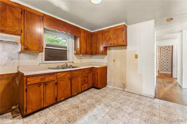 507 Tavern St, Blackstone, VA 23824 - kitchen with light flooring, brown cabinetry, and light countertops