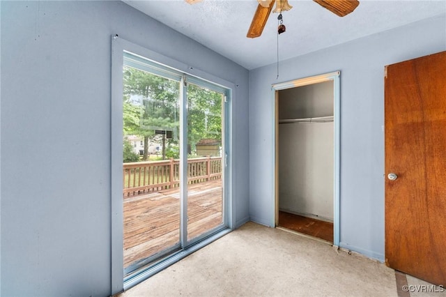 507 Tavern St, Blackstone, VA 23824 - unfurnished bedroom with access to exterior, a closet, and ceiling fan
