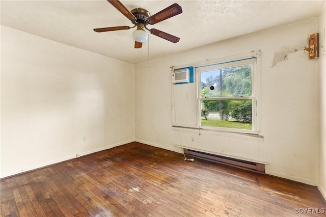 507 Tavern St, Blackstone, VA 23824 - empty room featuring a baseboard radiator, hardwood / wood-style flooring, ceiling fan, and a wall unit AC