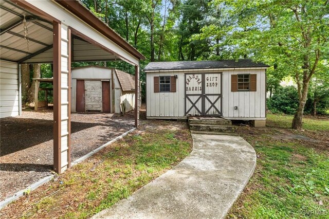 507 Tavern St, Blackstone, VA 23824 - view of shed featuring a carport
