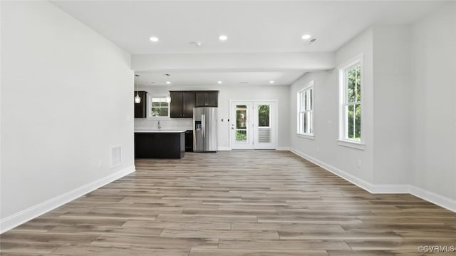 2916 Congress Rd, North Chesterfield, VA 23237 - unfurnished living room featuring light wood-type flooring and recessed lighting