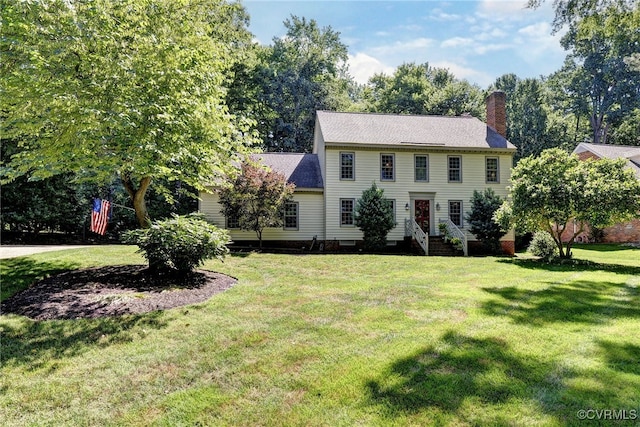 305 E Tazewells Way, Williamsburg, VA 23185 - colonial home with a chimney, entry steps, a front lawn, and crawl space