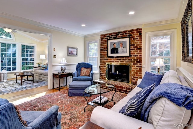 305 E Tazewells Way, Williamsburg, VA 23185 - living area with plenty of natural light, crown molding, a fireplace, wood finished floors, and recessed lighting