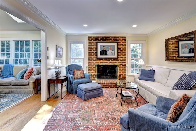 305 E Tazewells Way, Williamsburg, VA 23185 - living room with ornamental molding, wood finished floors, a fireplace, and recessed lighting