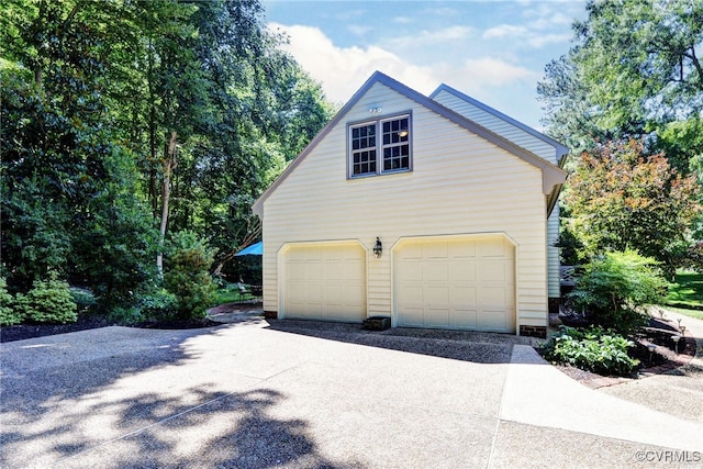 305 E Tazewells Way, Williamsburg, VA 23185 - view of home's exterior with a detached garage