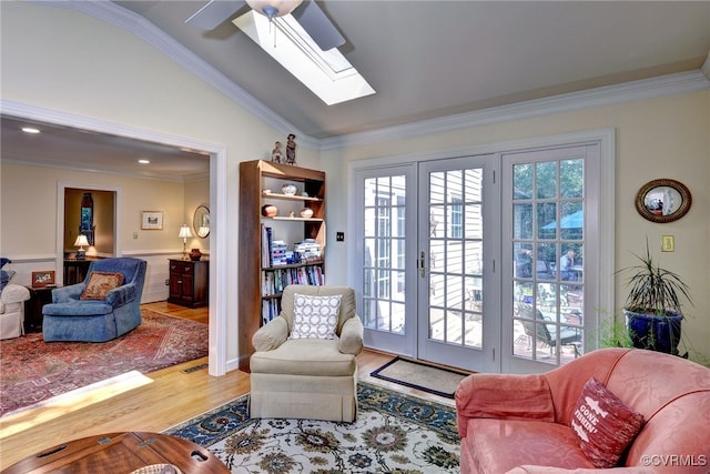 305 E Tazewells Way, Williamsburg, VA 23185 - sitting room with ornamental molding, french doors, wood finished floors, a skylight, and vaulted ceiling