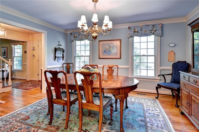 305 E Tazewells Way, Williamsburg, VA 23185 - dining space featuring a chandelier, healthy amount of natural light, and ornamental molding