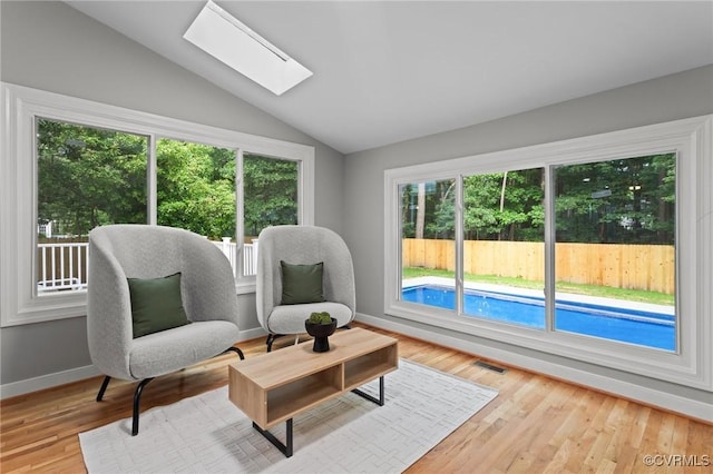 2941 Ellesmere Dr, Midlothian, VA 23113 - sitting room featuring lofted ceiling, a skylight, and wood finished floors