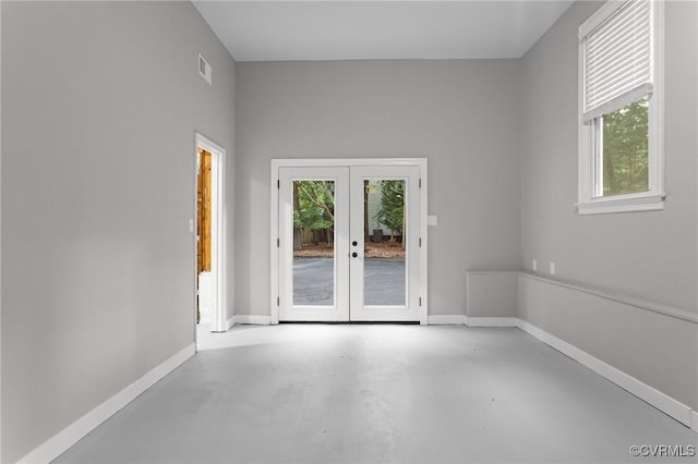 2941 Ellesmere Dr, Midlothian, VA 23113 - empty room with french doors, finished concrete floors, and plenty of natural light