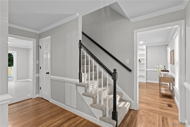2941 Ellesmere Dr, Midlothian, VA 23113 - stairs featuring wood finished floors and crown molding