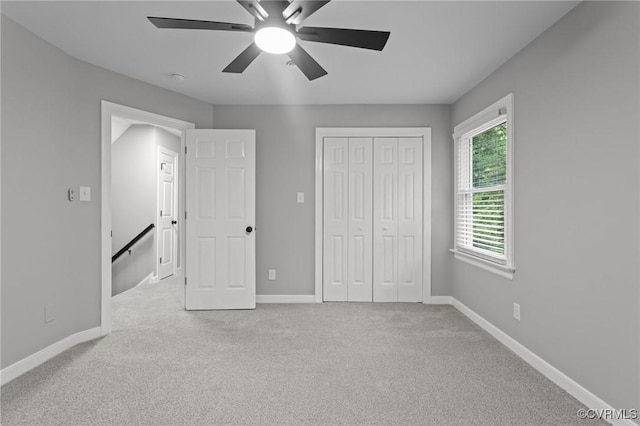 2941 Ellesmere Dr, Midlothian, VA 23113 - unfurnished bedroom with carpet, ceiling fan, and a closet