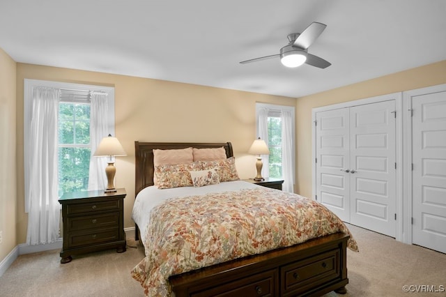 8300 Mckibben Dr, Chesterfield, VA 23838 - bedroom with light carpet, multiple windows, and two closets