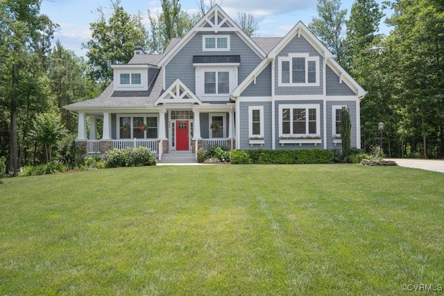 8300 Mckibben Dr, Chesterfield, VA 23838 - craftsman-style home with covered porch, a front yard, and a chimney