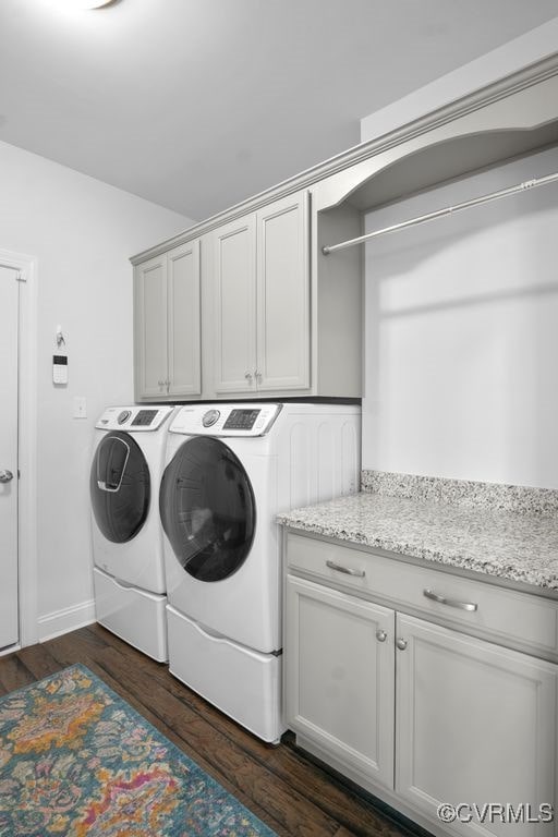 8300 Mckibben Dr, Chesterfield, VA 23838 - laundry area with cabinet space, washing machine and clothes dryer, and dark wood-style flooring