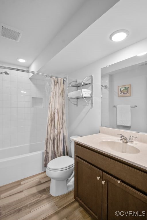 8300 Mckibben Dr, Chesterfield, VA 23838 - full bath featuring vanity, shower / bath combination with curtain, wood finished floors, and recessed lighting