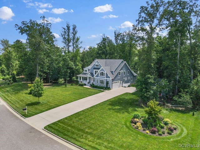 8300 Mckibben Dr, Chesterfield, VA 23838 - view of front facade featuring concrete driveway, a front lawn, and a garage