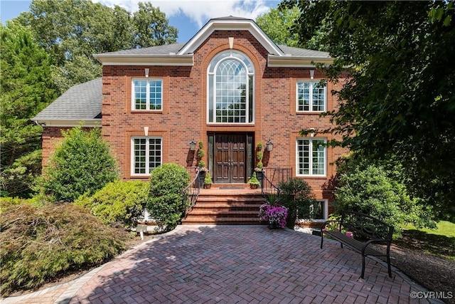 11916 Brookmeade Ct, Glen Allen, VA 23059 - view of front facade with brick siding and a shingled roof