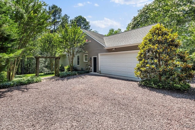 405 Elm Creek Dr, Manakin Sabot, VA 23103 - view of front of house with gravel driveway, a garage, and a shingled roof