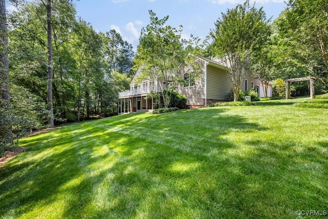 405 Elm Creek Dr, Manakin Sabot, VA 23103 - view of grassy yard with a garage, a deck, and a pergola