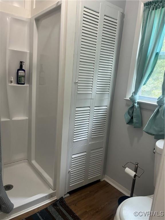12400 Richmond St, Chesterfield, VA 23831 - bathroom with a stall shower and wood finished floors