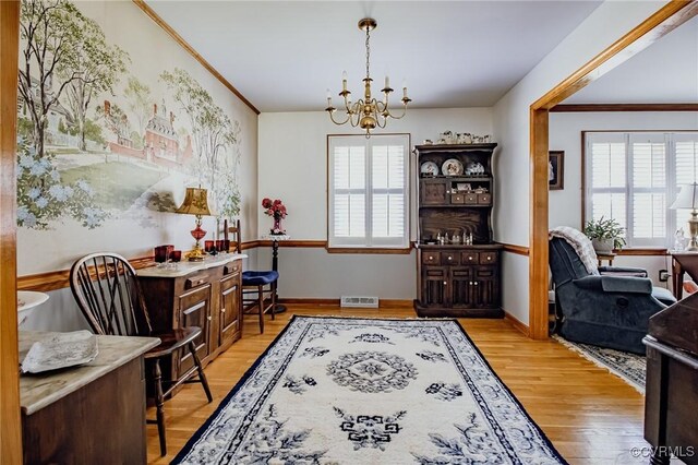 25014 James Ave, Dinwiddie, VA 23803 - office area with a chandelier, healthy amount of natural light, crown molding, and light wood-style floors