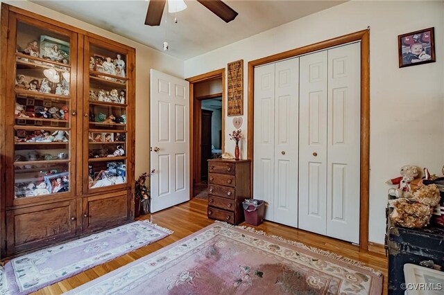25014 James Ave, Dinwiddie, VA 23803 - bedroom with light wood finished floors, a closet, and a ceiling fan