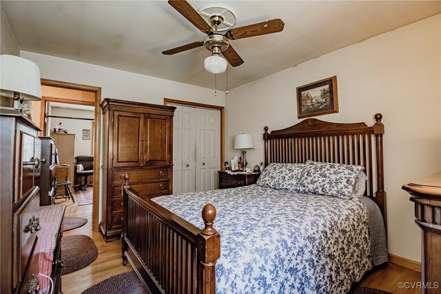 25014 James Ave, Dinwiddie, VA 23803 - bedroom featuring light wood-type flooring, a closet, and a ceiling fan