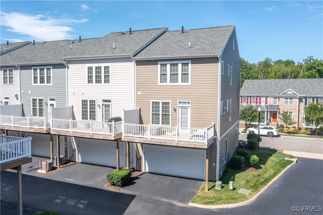 14432 Michaux Village Dr, Midlothian, VA 23113 - rear view of house with a garage, driveway, and a shingled roof