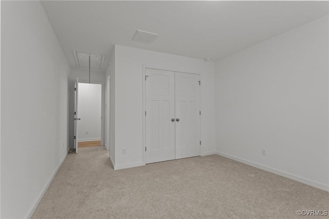 8507 Mckibben Dr, Chesterfield, VA 23838 - unfurnished bedroom featuring attic access, light colored carpet, and a closet