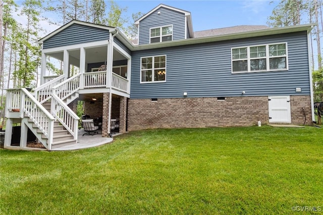 8507 Mckibben Dr, Chesterfield, VA 23838 - rear view of property featuring stairway, a lawn, a patio area, a sunroom, and crawl space