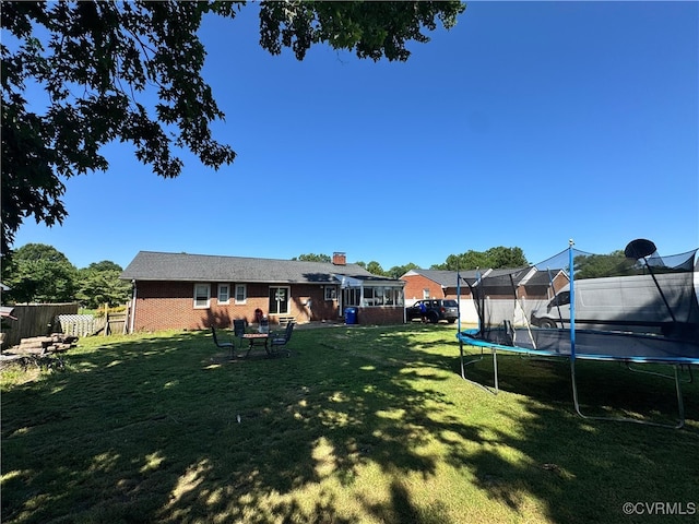7360 Ford Ave, Mechanicsville, VA 23111 - fenced yard featuring a trampoline