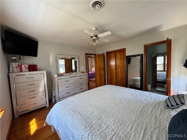 7360 Ford Ave, Mechanicsville, VA 23111 - bedroom featuring dark wood-style flooring and ceiling fan