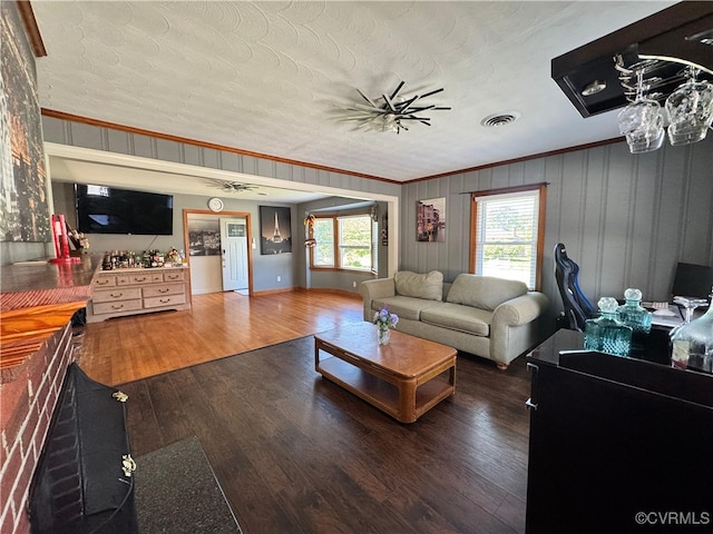 7360 Ford Ave, Mechanicsville, VA 23111 - living room featuring wood finished floors and ornamental molding