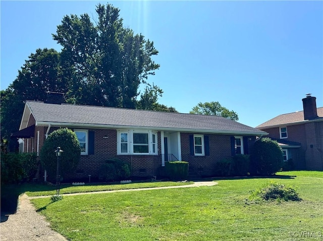 7360 Ford Ave, Mechanicsville, VA 23111 - ranch-style home with a front yard and brick siding